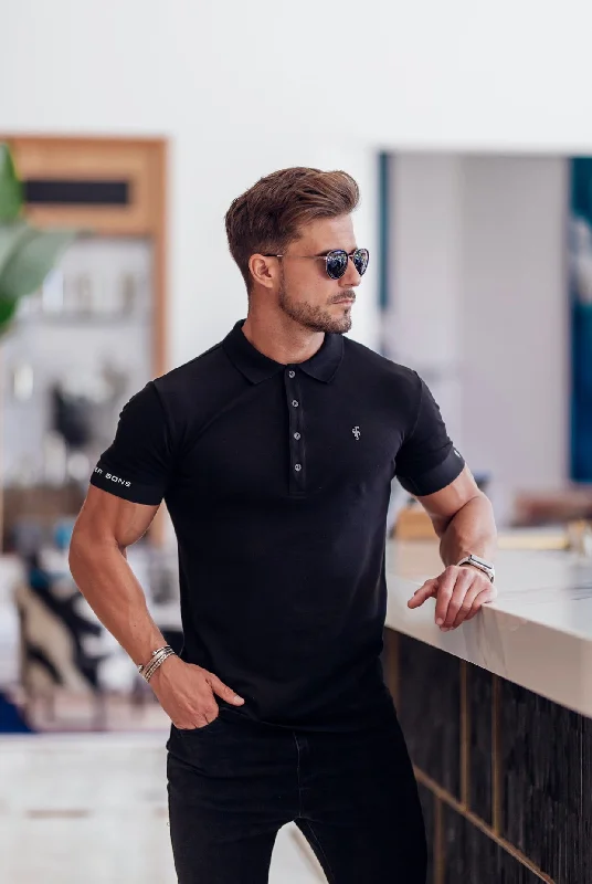 men’s short sleeve shirts with cool prints -Father Sons Classic Black Polo with FS Elastic Sleeve Branding and Black Metal Emblem - FSH631